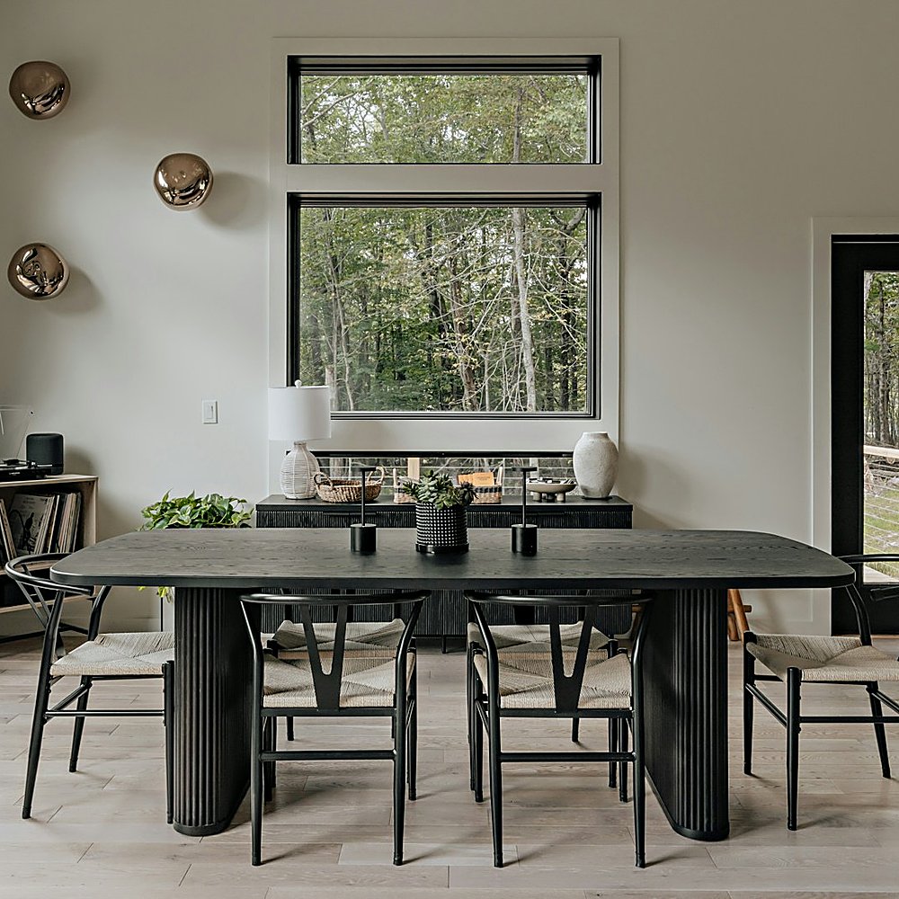 Warm Modern style dining room designed by Next Level Design