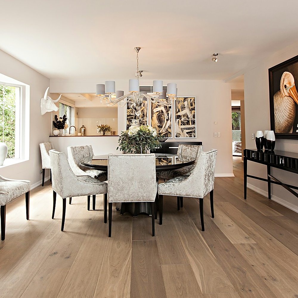 Warm Modern style dining room designed by Next Level Design