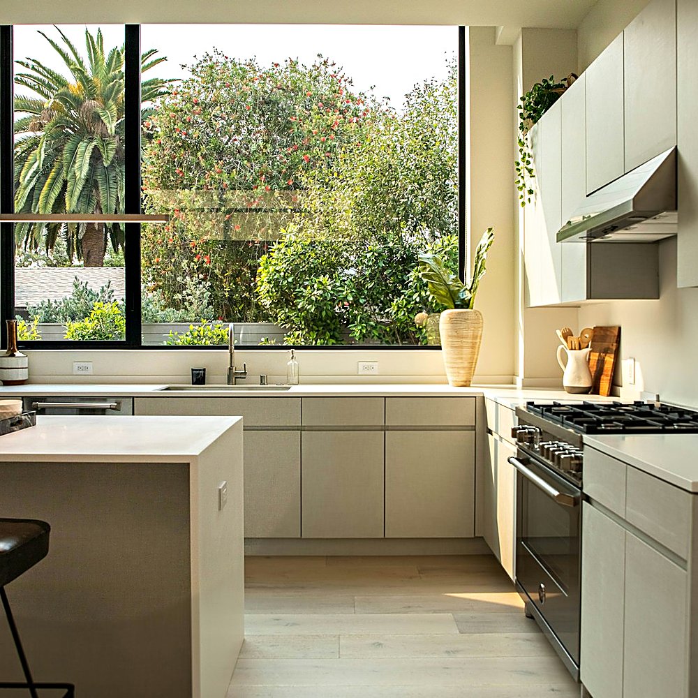 Warm Modern style kitchen designed by Next Level Design